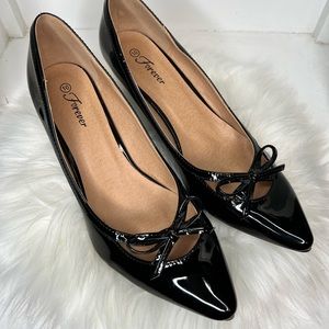 Black pointed high heels with bow size 10